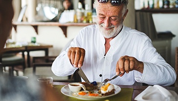 Man eating breakfast