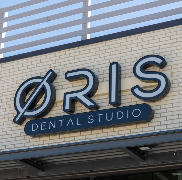 Three young women smiling together