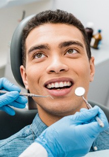 a patient undergoing a dental checkup near Lake Travis