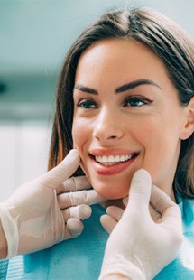 a woman smiling after undergoing cosmetic dentistry near Lake Travis