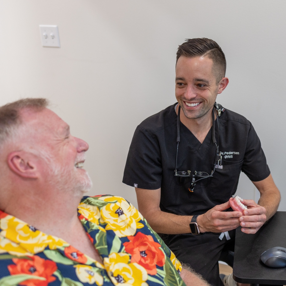 Older woman smiling in dental chair