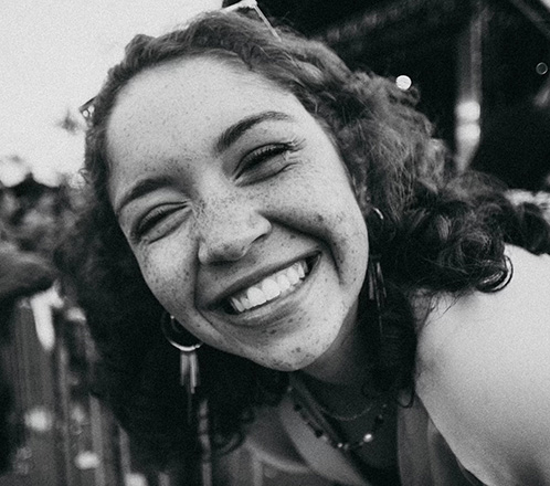 Woman with tooth colored fillings smiling