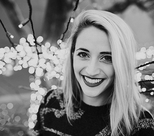 Woman with dental bridge smiling