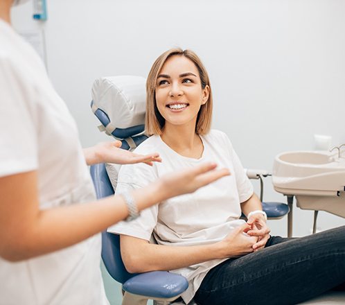 a patient talking to dentist about Sure Smile in Lakeway