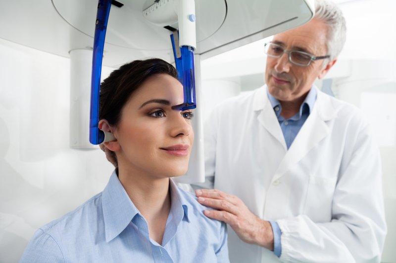 A woman being prepped for her dental implant CBCT scan